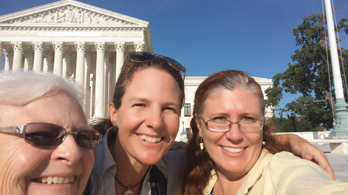 Maureen Dowd, Krista Schlyer, and Cyndi Tuell in fron of the U.S. Supreme Court
