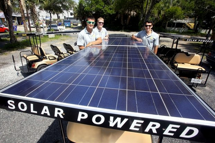 Solar panels on roof of golf cart