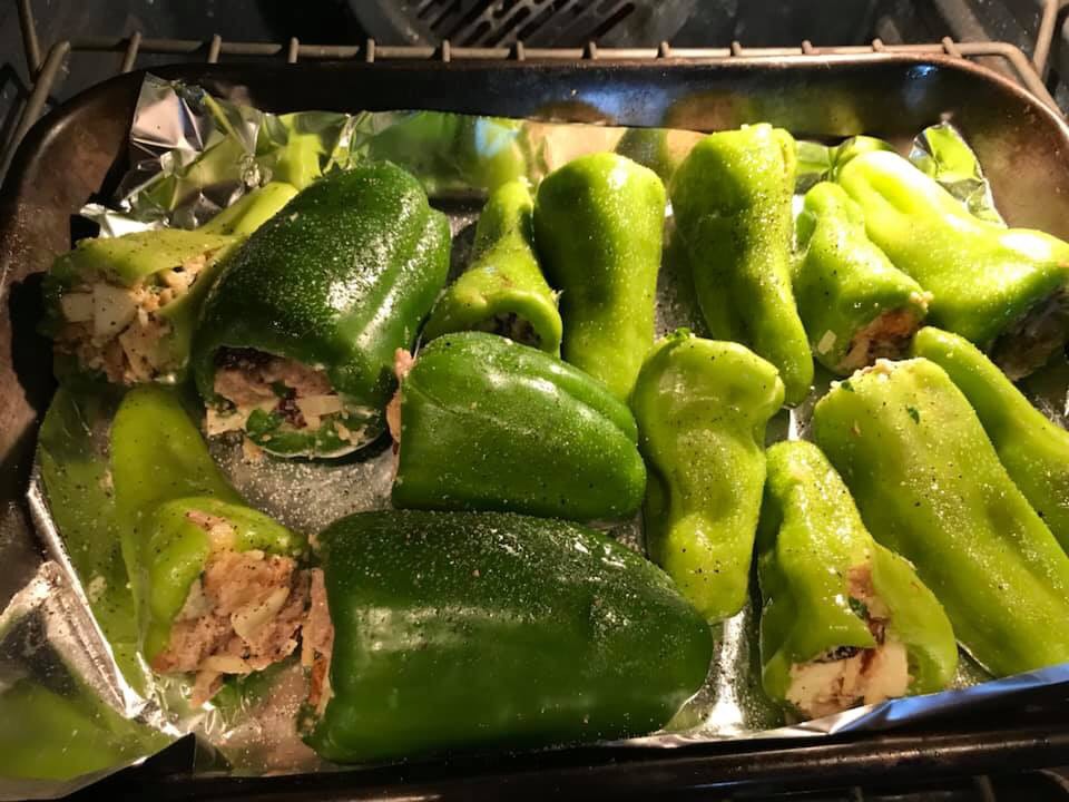 Stuffed peppers cook in an oven