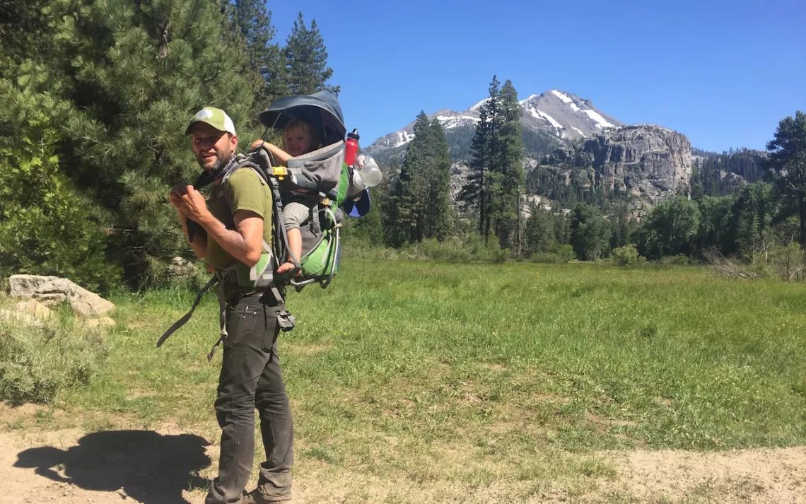 Jason Mark backpacking with his daughter