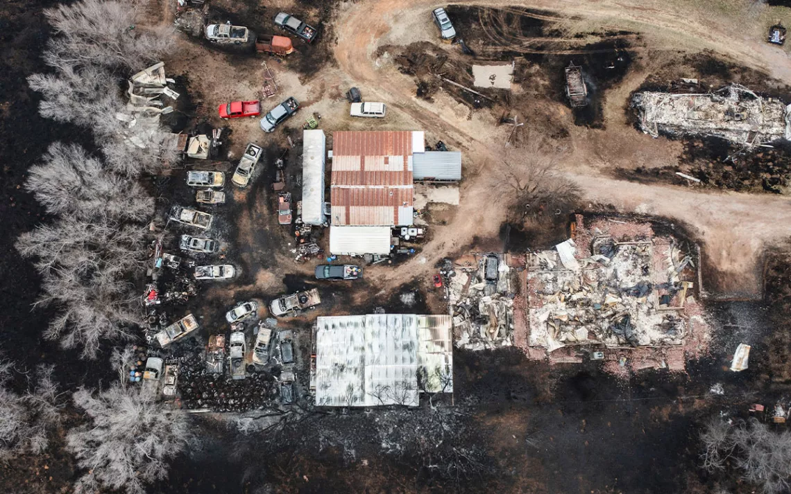 Multiple vehicles and multiple residences are seen destroyed by the Smokehouse Creek Fire in Canadian, Texas