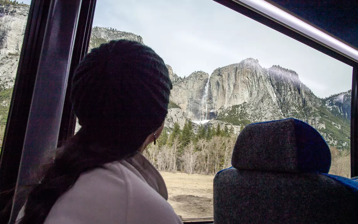 Large windows of YARTS public transit buses give riders great views of Yosemite’s iconic landmarks like Yosemite Falls.