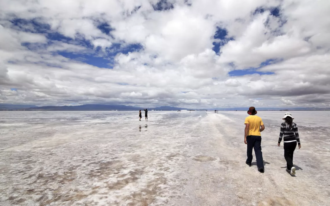 Vast sky meets the cracked, crusty expanse of Argentina's Salinas Grandes.