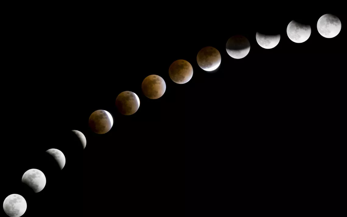 A series of images shows the progression of a lunar eclipse.