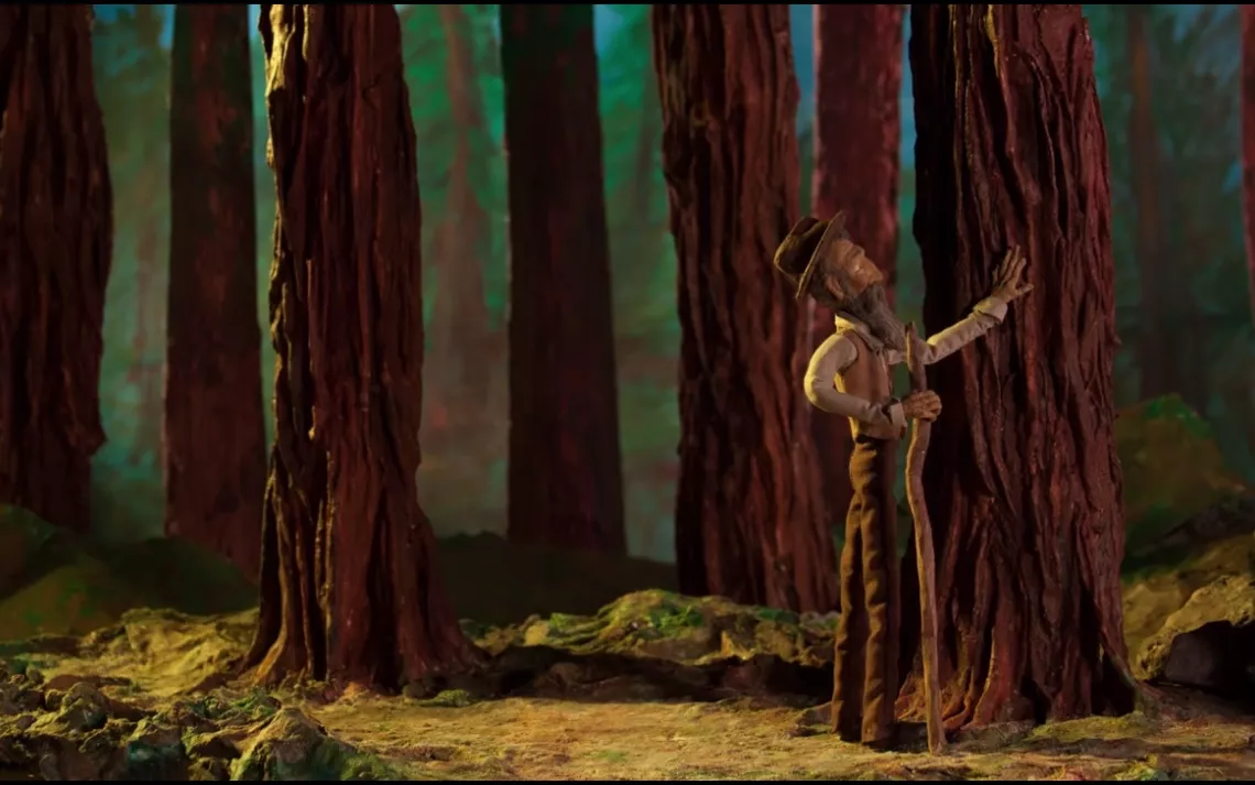 Tiny stop-motion John Muir admiring a tree trunk