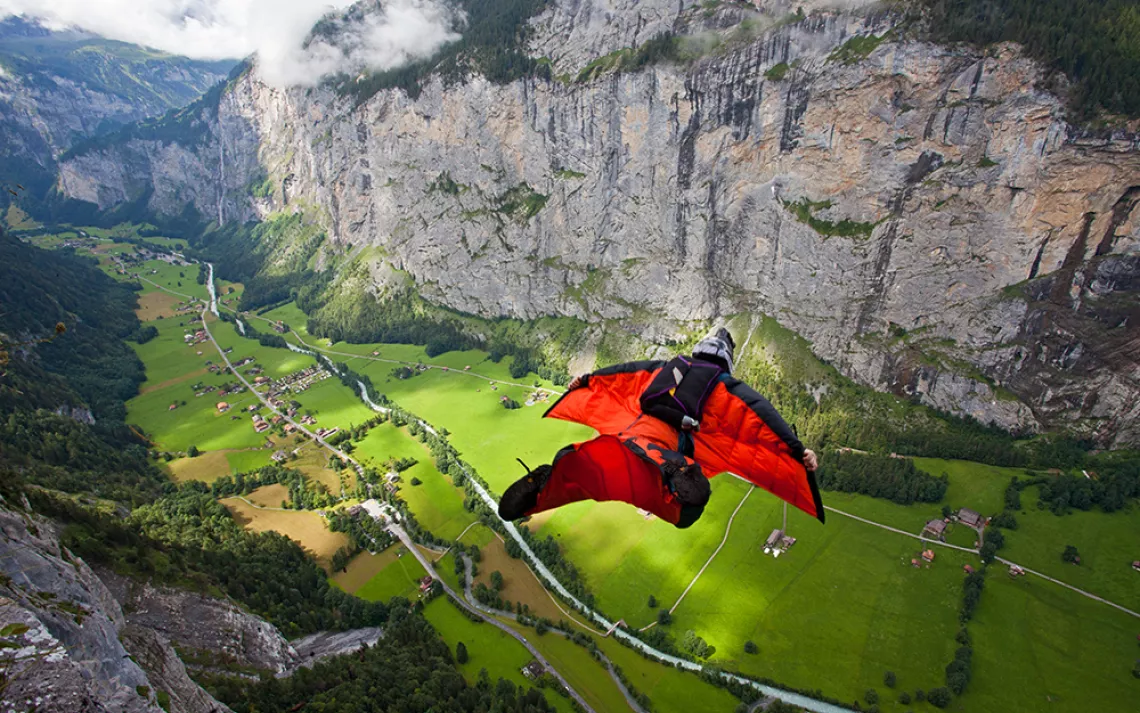 Jamie-Flynn wing-suiting in the Lauterbrunnen valley in Switzerland. Photo by Jon Griffith in Alpine Exposures.