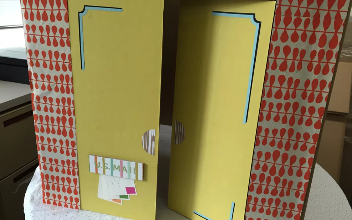 If you haven't yet, decorate the door(s), painting, papering, and adding features like a doorbell or mail slot.