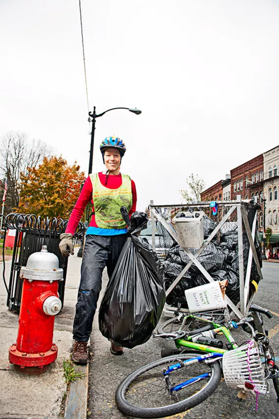 Rain, shine, or snow, Ruthy Woodring, cofounder of Pedal People, hauls away trash and recyclables for clients in Northampton, Massachusetts.