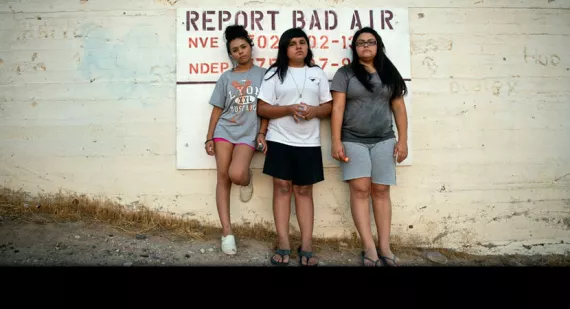 Aaliya, Ayona, and Zayda Hernandez near their home on the Moapa Band of Paiutes Reservation, about an hour north of Las Vegas. Since 1965, coal ash from the Reid Gardner Generating station has been dumped into uncovered ''ponds'' less than a half-mile fro