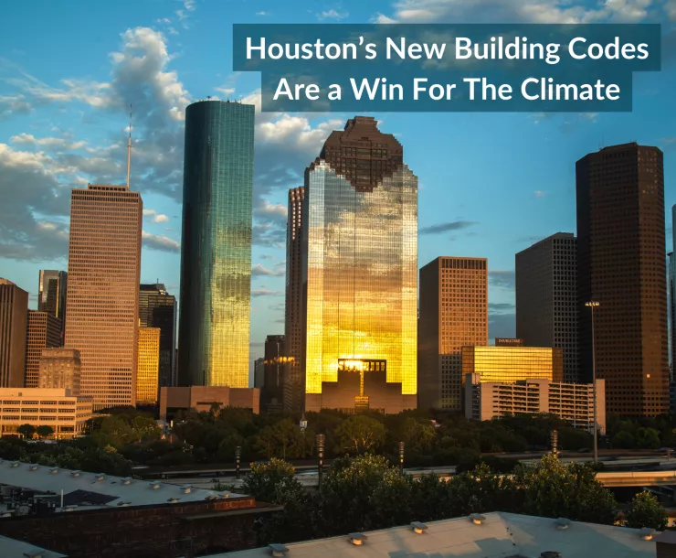 The sunset glints off the reflective windows on the buildings of downtown Houston. Text: Houston's new building codes are a win for the climate