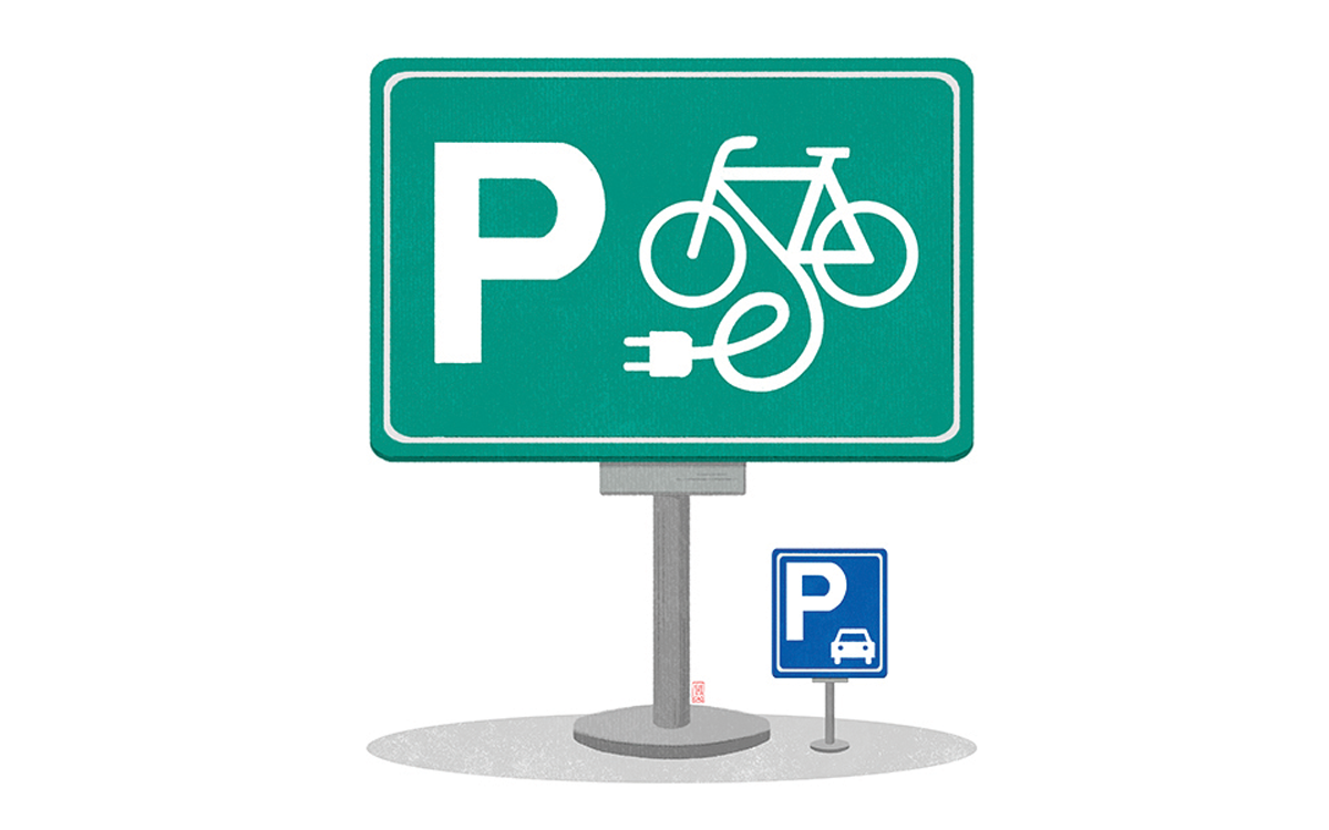 Illustration shows two signs: One is larger, with a P and a bike with a charger, and one is a P with a car.