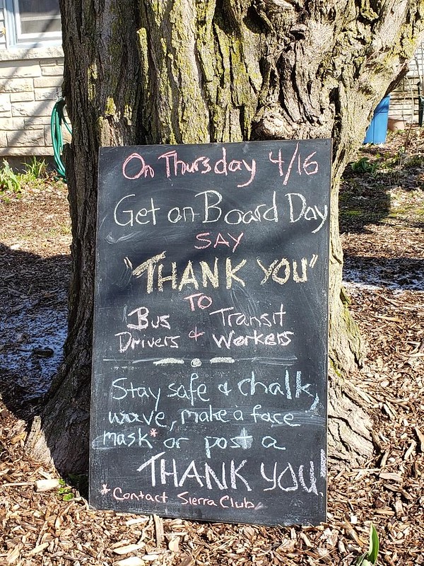 A chalkboard sign listing ways to celebrate Get On Board Day