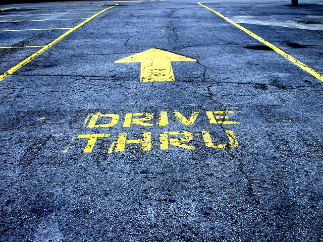 Drive Thru Sign on Pavement. Photo by frankieleon.