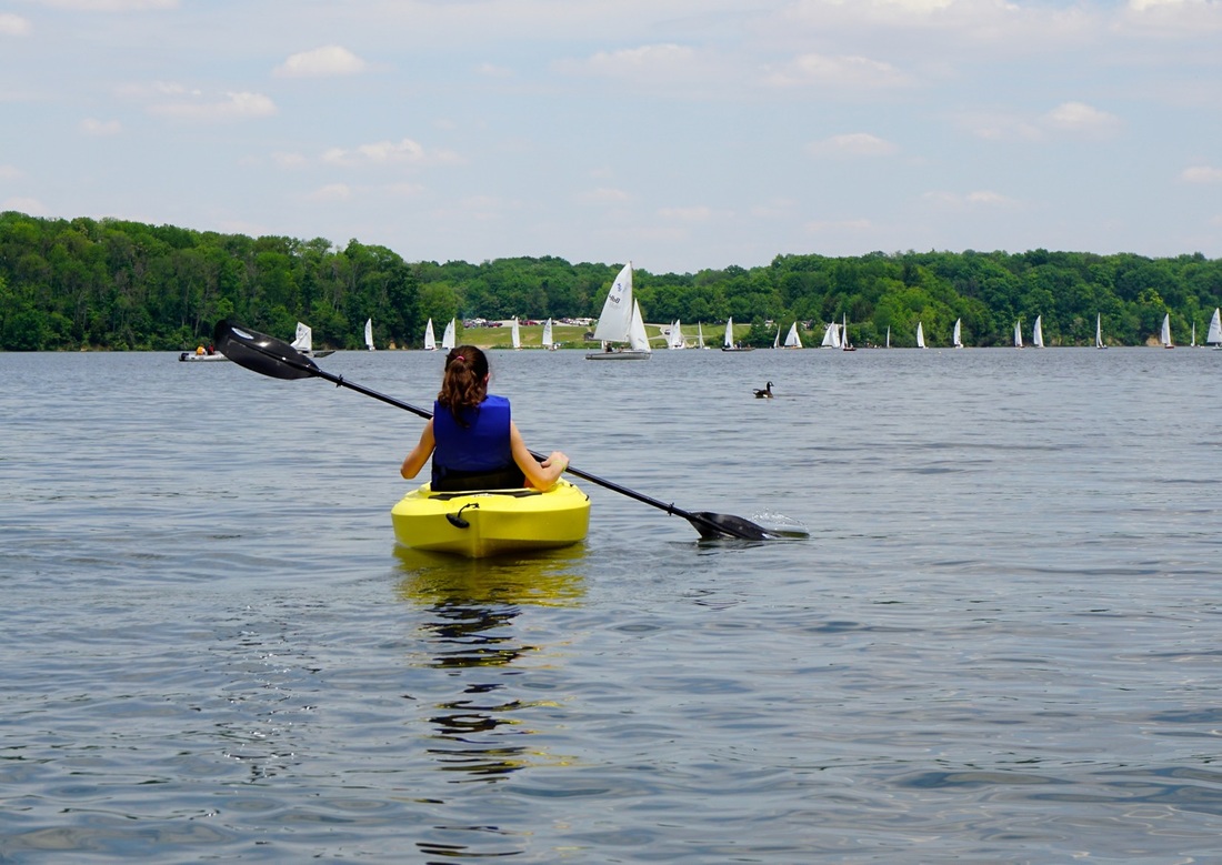 Woman kayaking on Cowan Lake