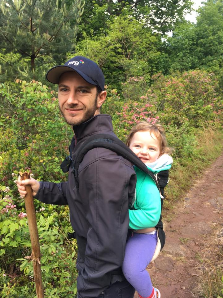 Josh holding his daughter