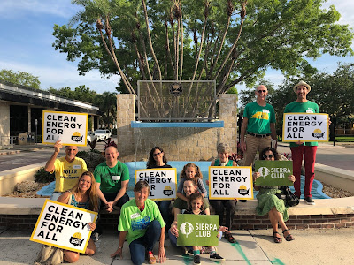 Sierra Club Miami volunteers gather at City Hall to show support.