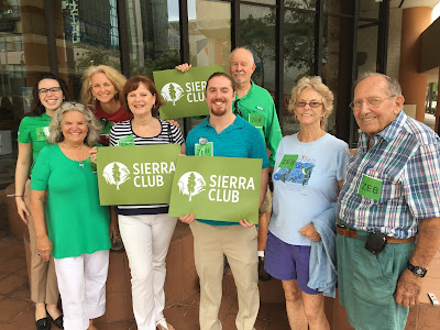 Sierra Club volunteers meet in Broward County to support zero-emission buses. 