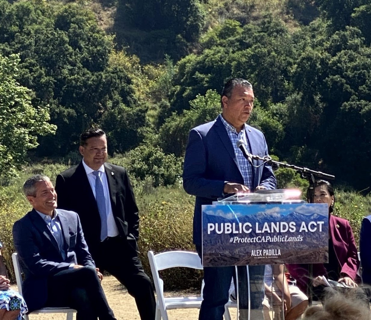 Alex Padilla speaking at the San Gabriels Event. On left, Wade Crowfoot, Secretary of CA Natural Resources Agency, and Pasadena Mayor Victor Gordo.  Photo Credit: Morgan Goodwin. 