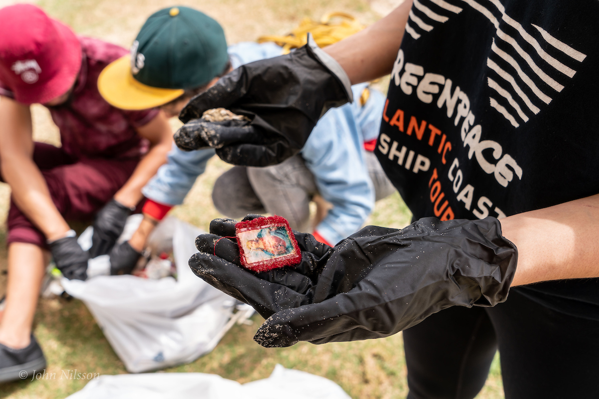 Volunteers sort gathered plastic pollution