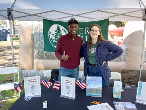 Steve Dunwoody and Annie Wensley table for Sierra Club at Veteran's Day Celebration in Long Beach, CA