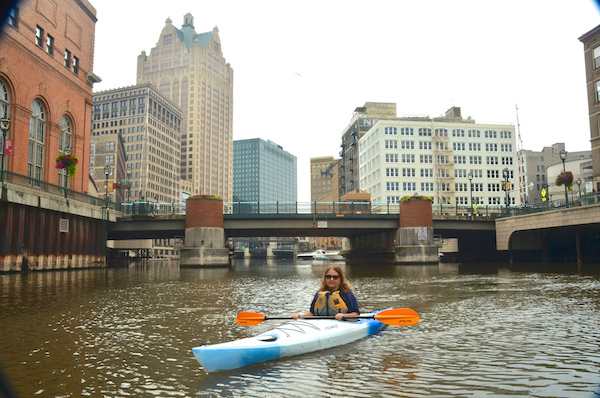 Cheryl Nenn in kayak on Milwaukee River downtown