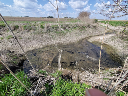 Image of massive sinkhole and runoff draining into the sinkhole near Ethan’s farm.