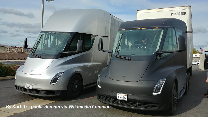Pictured are two Tesla semi-truck prototypes at a supercharging station in 2018.