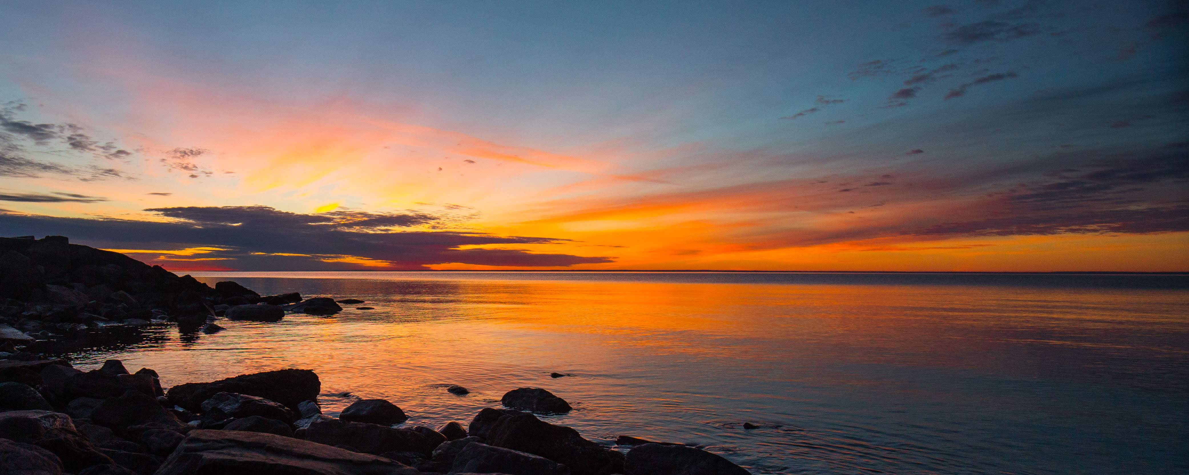 photo of Lake Superior at sunrise, photo credit: Chuck Dayton