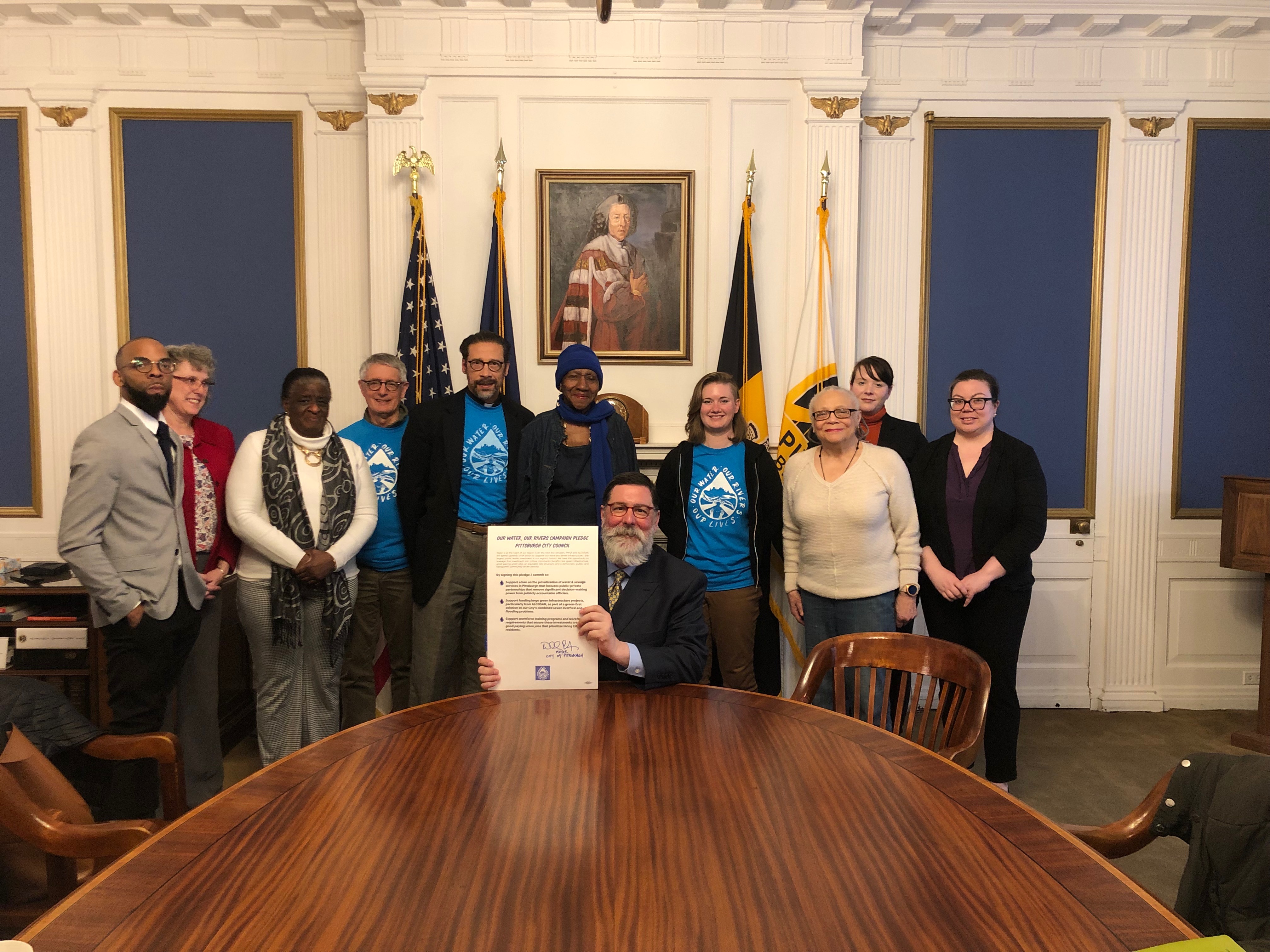 Mayor Peduto holding signed pledge