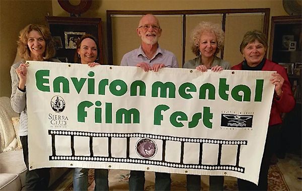 Photo: Kathryn Allen (far right) celebrating Environmental Film Festival with Fellow Volunteers