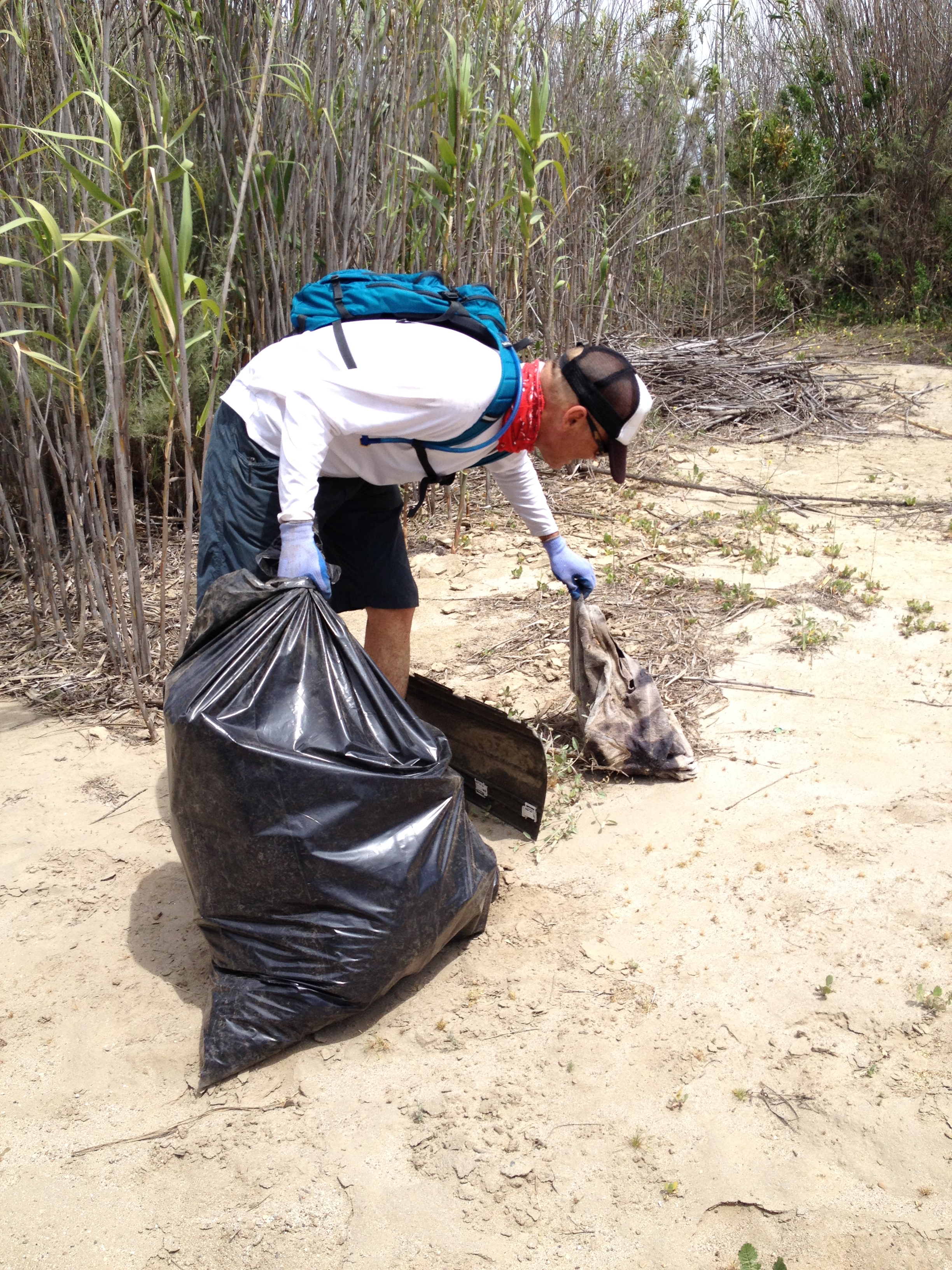 Volunteer participating in a river cleanup