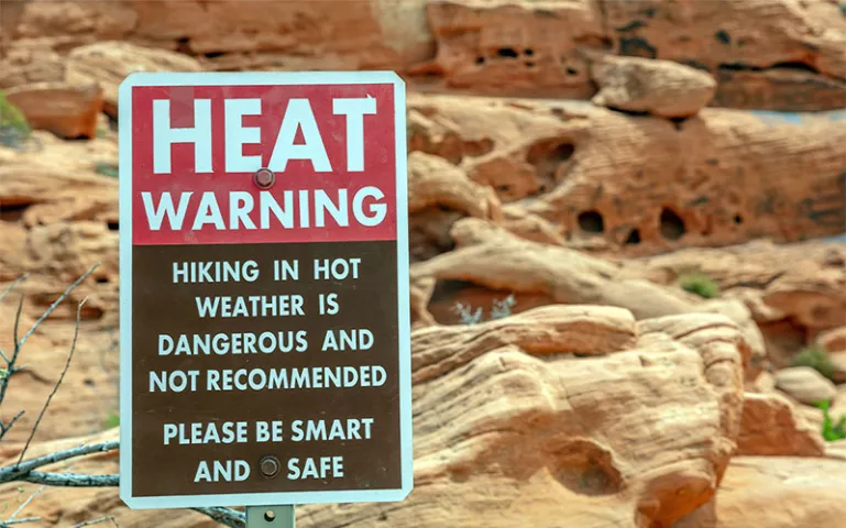 Heat warning sign in Valley of Fire State Park, Nevada USA