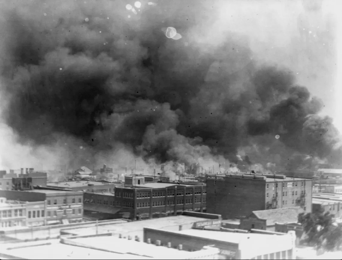 Smoke billows over Tulsa during the 1921 Tulsa Race Massacre