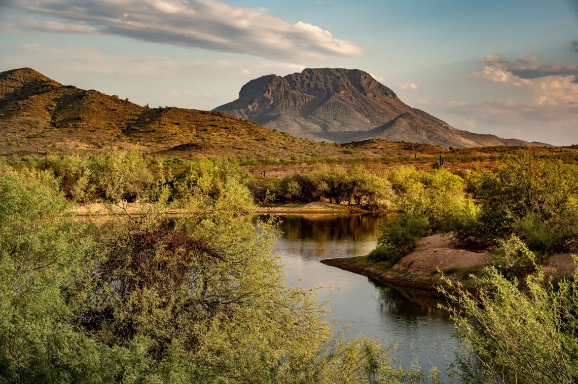 Woolsey Peak rises above the Gila River in Arizona