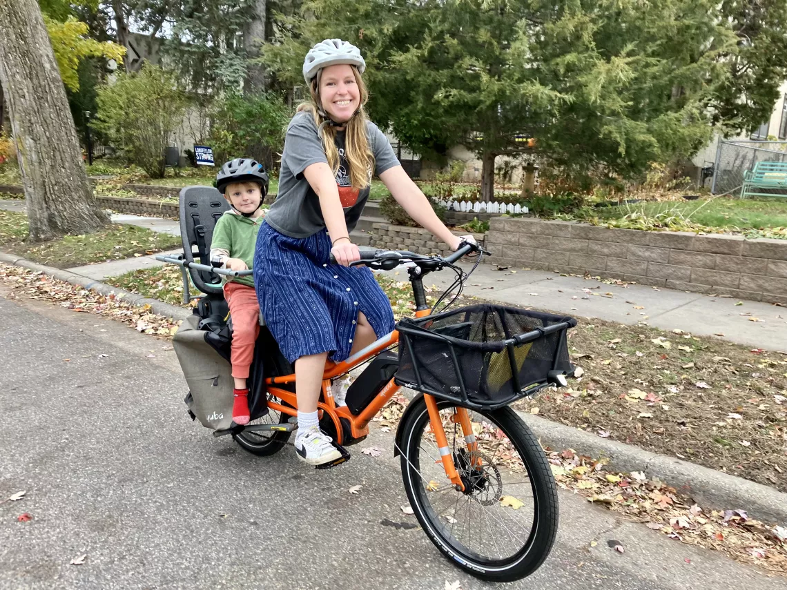 Mary Blitzer and child on a cargo bike