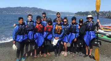Youth outfitted for sea kayaking, sea kayaks and SF Bay