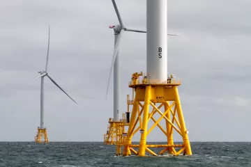 Photo of offshore wind turbines in the ocean by Gary Norton (Department of Energy)