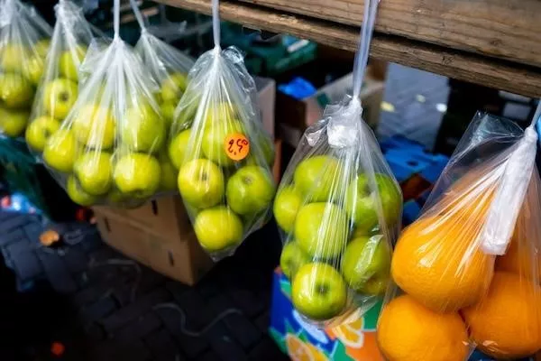 Apples in bags, Recycling and Compost Bin