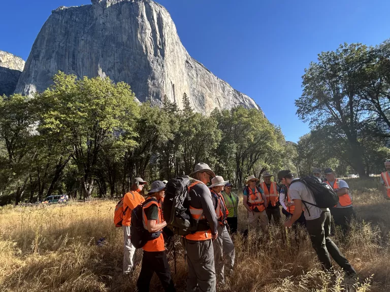 a group of Sierra Club members in front ot Yosemite mountain