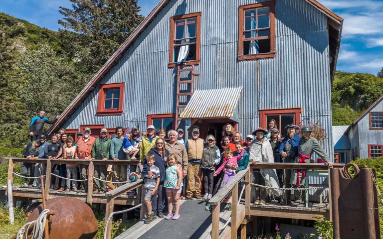 The historic Snug Harbor Cannery is a wilderness lodge on Chisik Island that continues to serve as a hub of community life for generations of commercial fishing families in Alaska’s Tuxedni Bay. The cannery was named to the National Register of Historic Places in 2023. | Photo by Hamish Laird