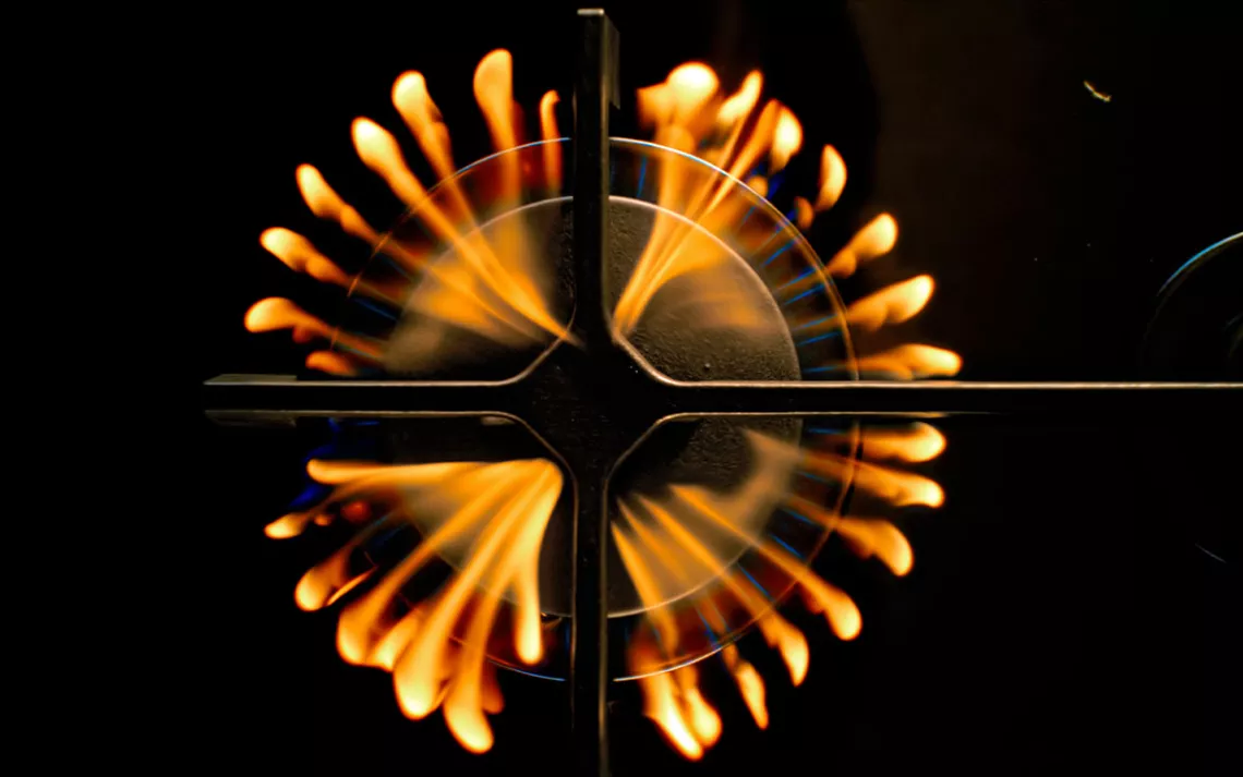 Close-up of flame on gas stove burner