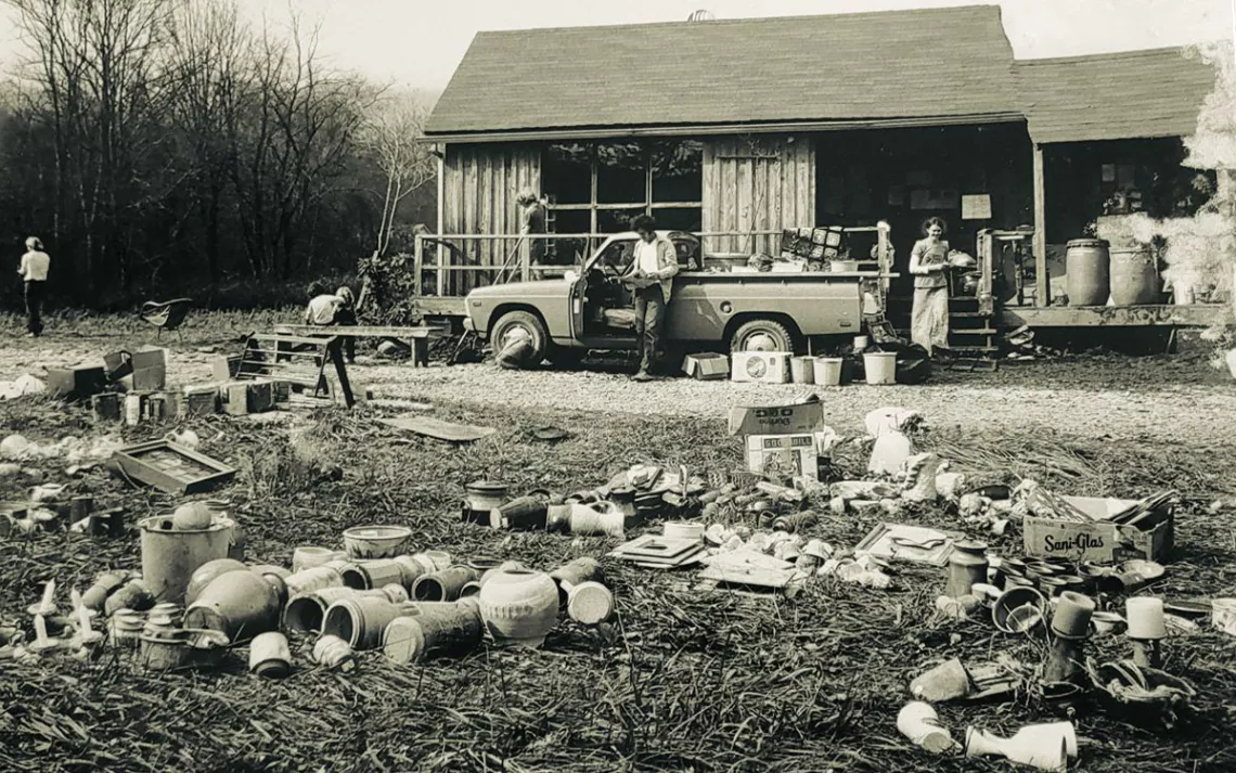 Toe River Crafts artists set pottery and other works out to dry following a major flood in 1977.