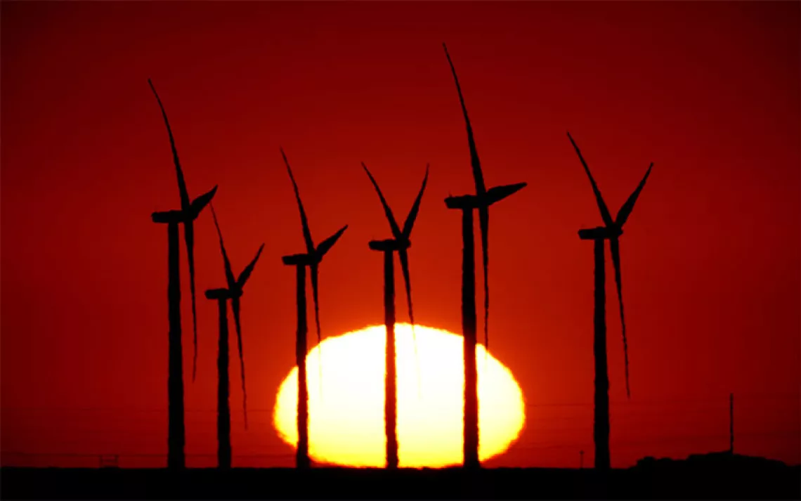 Windmills in front of a setting sun