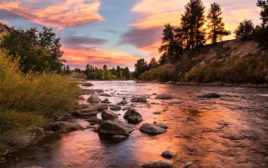 The rising sun reflected on the Colorado portion of the Arkansas River. 