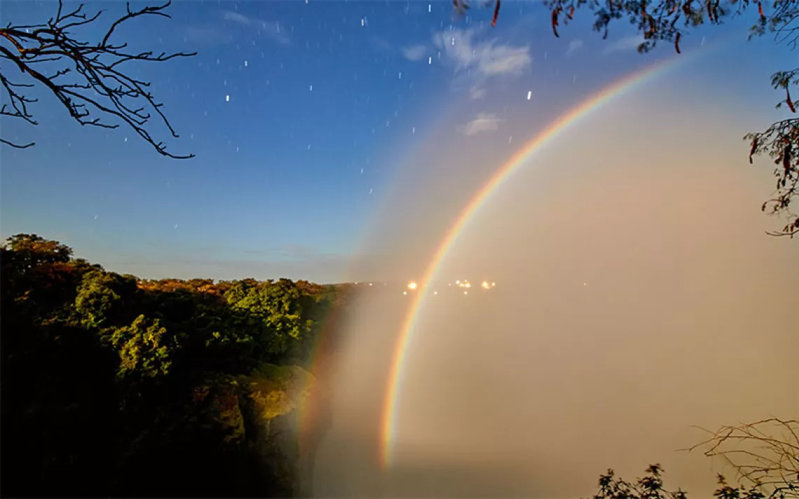 Moonbow in Victoria Falls in Zambia. Photo by lennjo/iStock