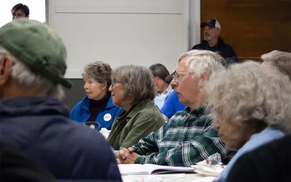 Maine residents at a town meeting