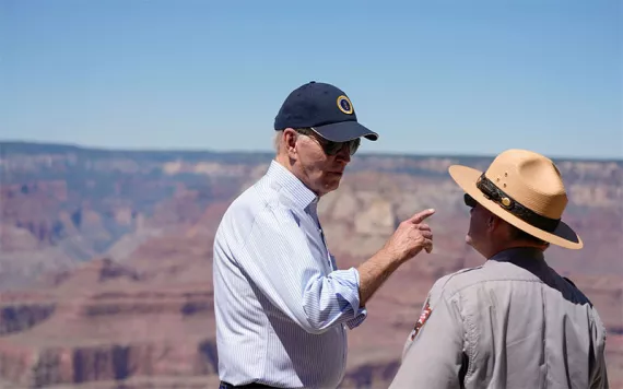 President Joe Biden talks with Ed Keable, superintendent of Grand Canyon National Park in Grand Canyon Village, Ariz., Tuesday, Aug. 8, 2023, as he views the South Rim of the canyon at Yaki Point. | Photo by Alex Brandon/AP