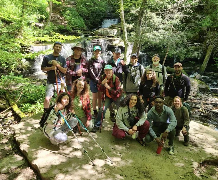 A group of chapter staff and volunteer outings leaders along the Falls Trail at Ricketts Glen State Park.
