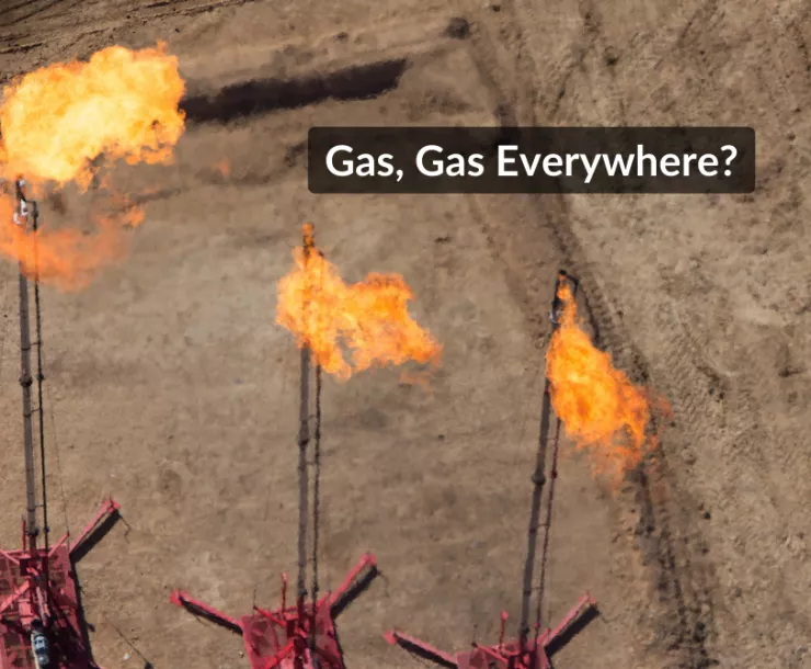 Three gas flares in a row inside a pit. Text: Gas, Gas Everywhere?