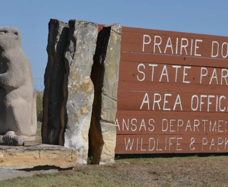 statue of prairie dog with entrance sign to Prairie Dog State Park